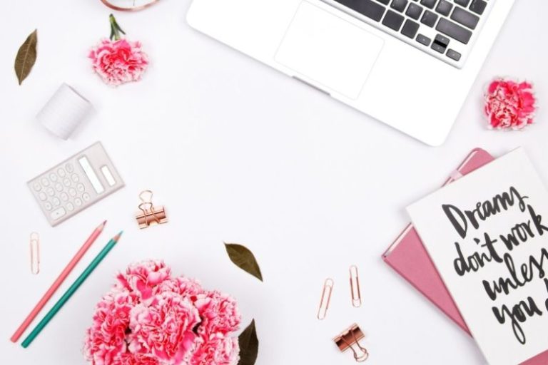 laptop and pink desk accessories